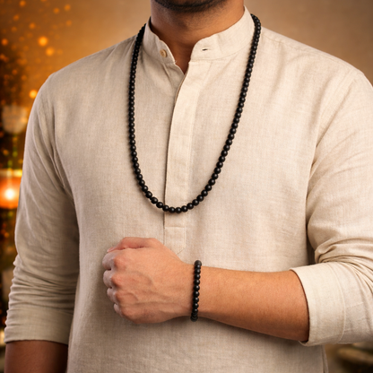 A spiritual combo set featuring a Karungali Malai and a matching bracelet, both made from 8mm genuine black ebony wood beads. The set is displayed alongside its official Government Laboratory Certificate, verifying the authenticity of the wood. The beads have a smooth, natural matte finish and are strung on a durable cord.