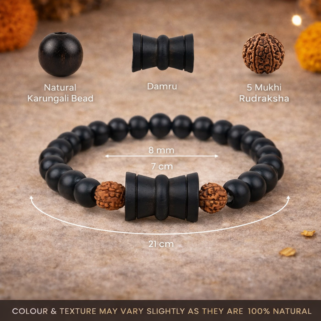 A spiritual healing bracelet featuring alternating 8mm natural brown Rudraksha beads and polished black Karungali (Ebony wood) beads. The center features a detailed silver-toned Damru charm, symbolizing Lord Shiva's energy, all strung on a durable elastic cord.