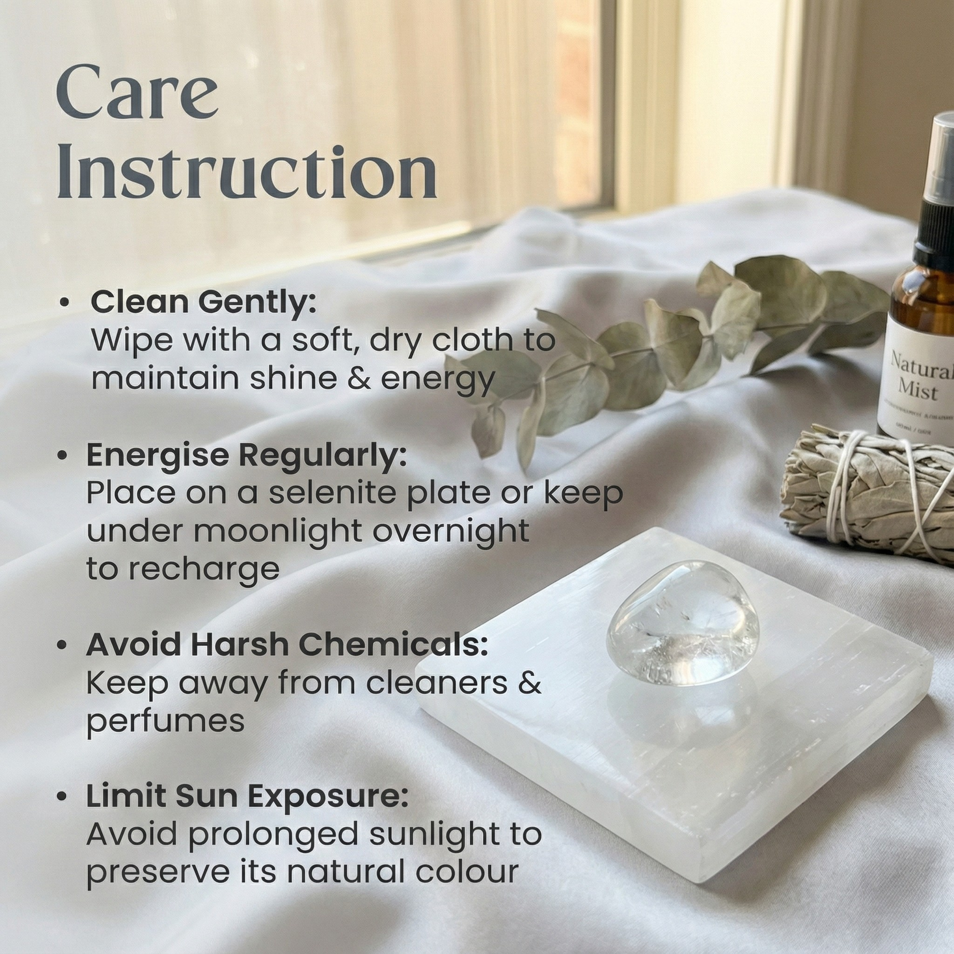 Polished Clear Quartz tumble stone on a white surface, known for clarity, energy cleansing, and healing amplification.