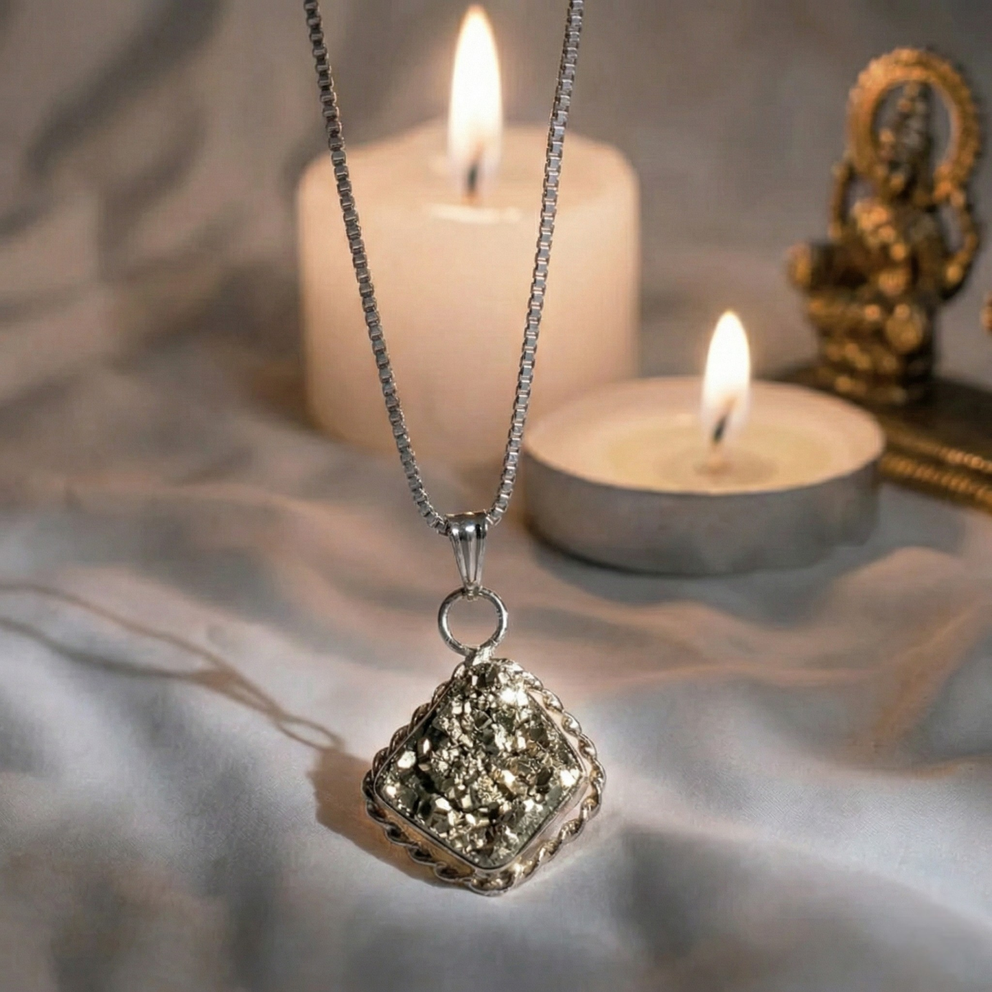 Dhan Prapti wealth manifestation combo featuring a Pyrite bracelet and Citrine crystal for attracting money and financial success.