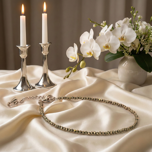 A pair of natural golden Pyrite beaded anklets designed for wealth manifestation and spiritual grounding